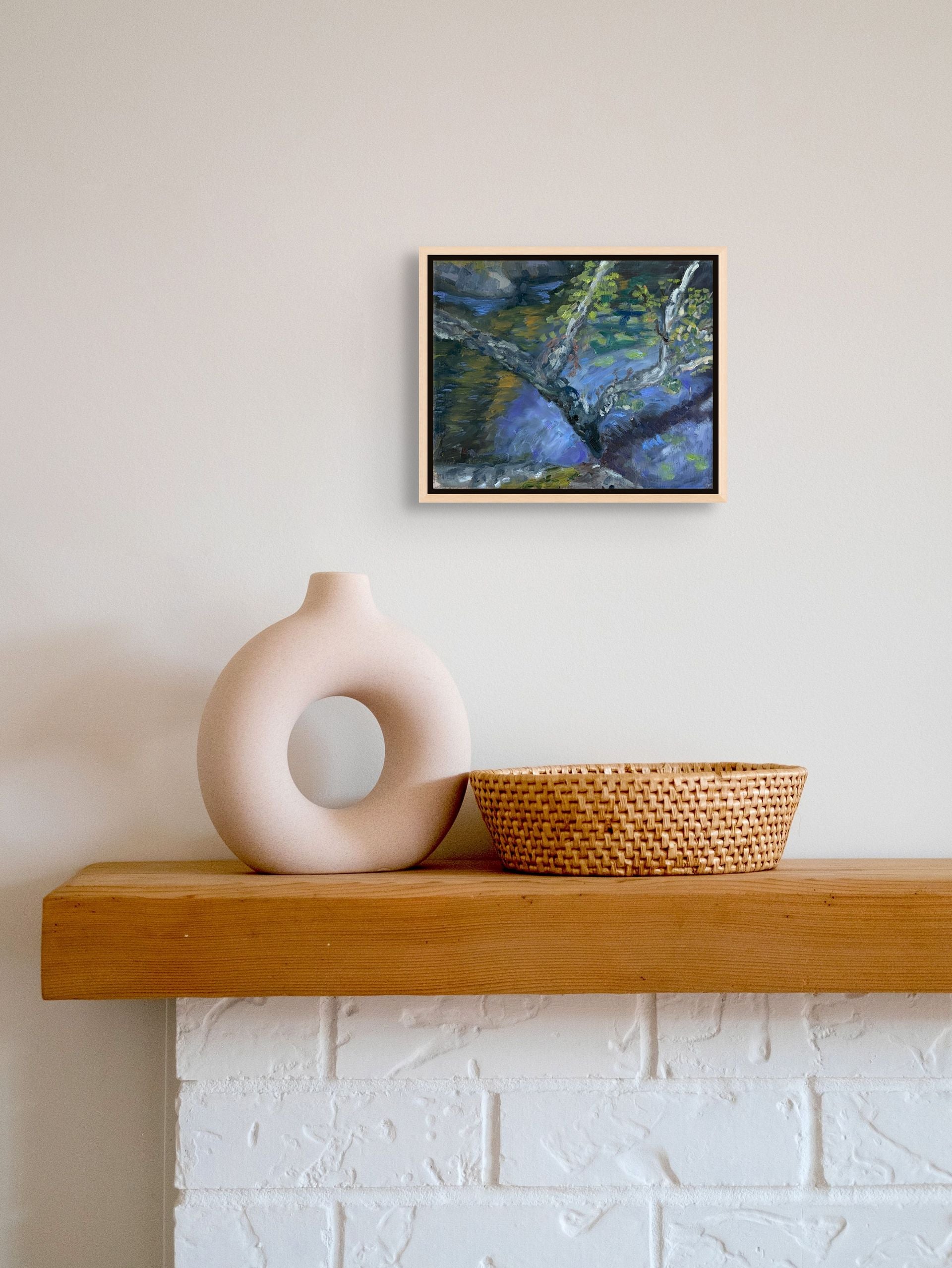 "Whispering Waters original oil painting displayed with a vase, by Sally Herriott"