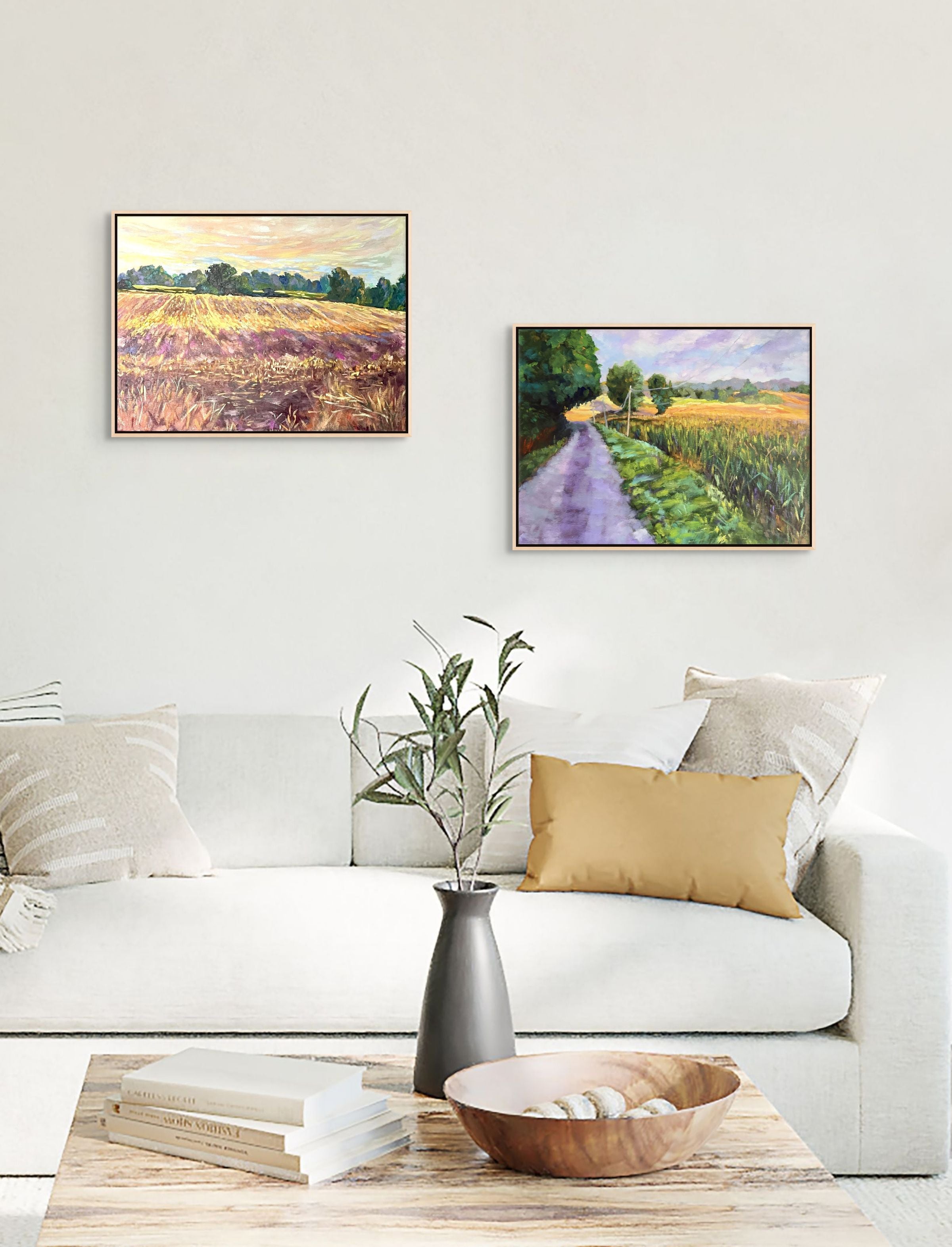 "After the Harvest and Morning Meadows original oil paintings in a cosy lounge, Puy Vidal France, by Sally Herriott"