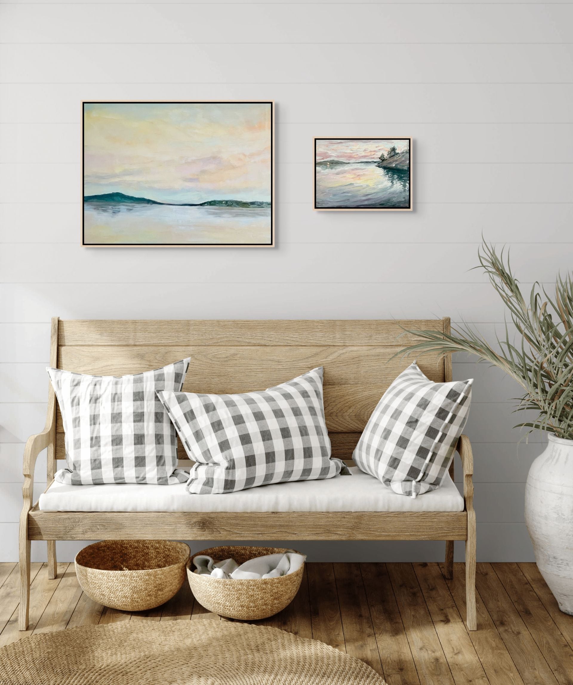 "Icecream Skies and Tranquil Reflections original oil paintings displayed above a bench, Saltsjöbaden Sweden, by Sally Herriott"