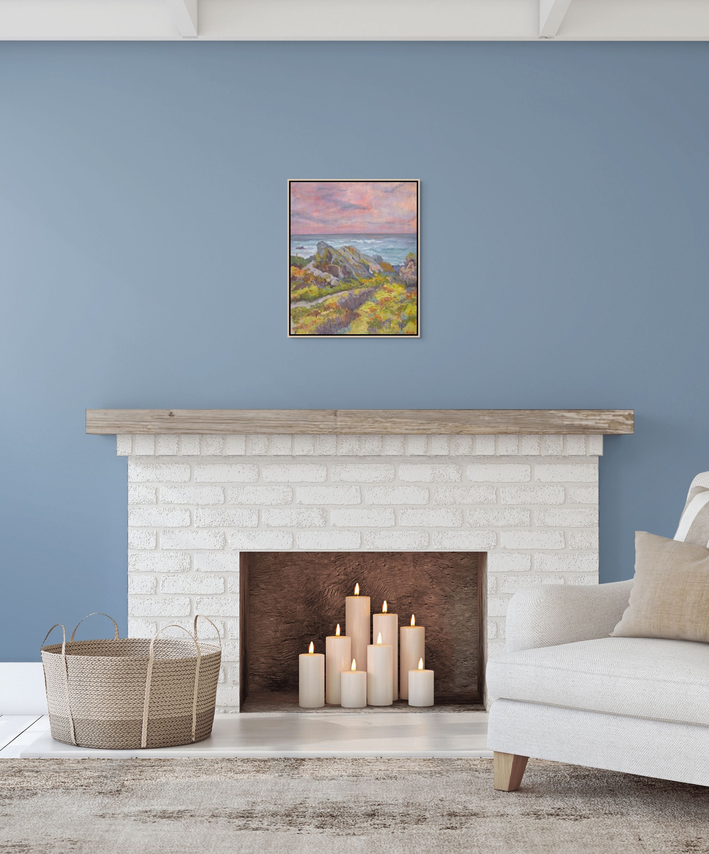 "Restless Rocks original oil painting above a blue fireplace, by Sally Herriott"