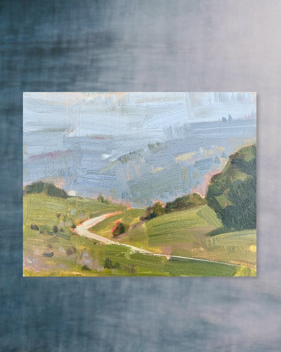 Small original oil painting of rolling green Ojai Valley hills with fog and sun, California, by Sally Herriott
