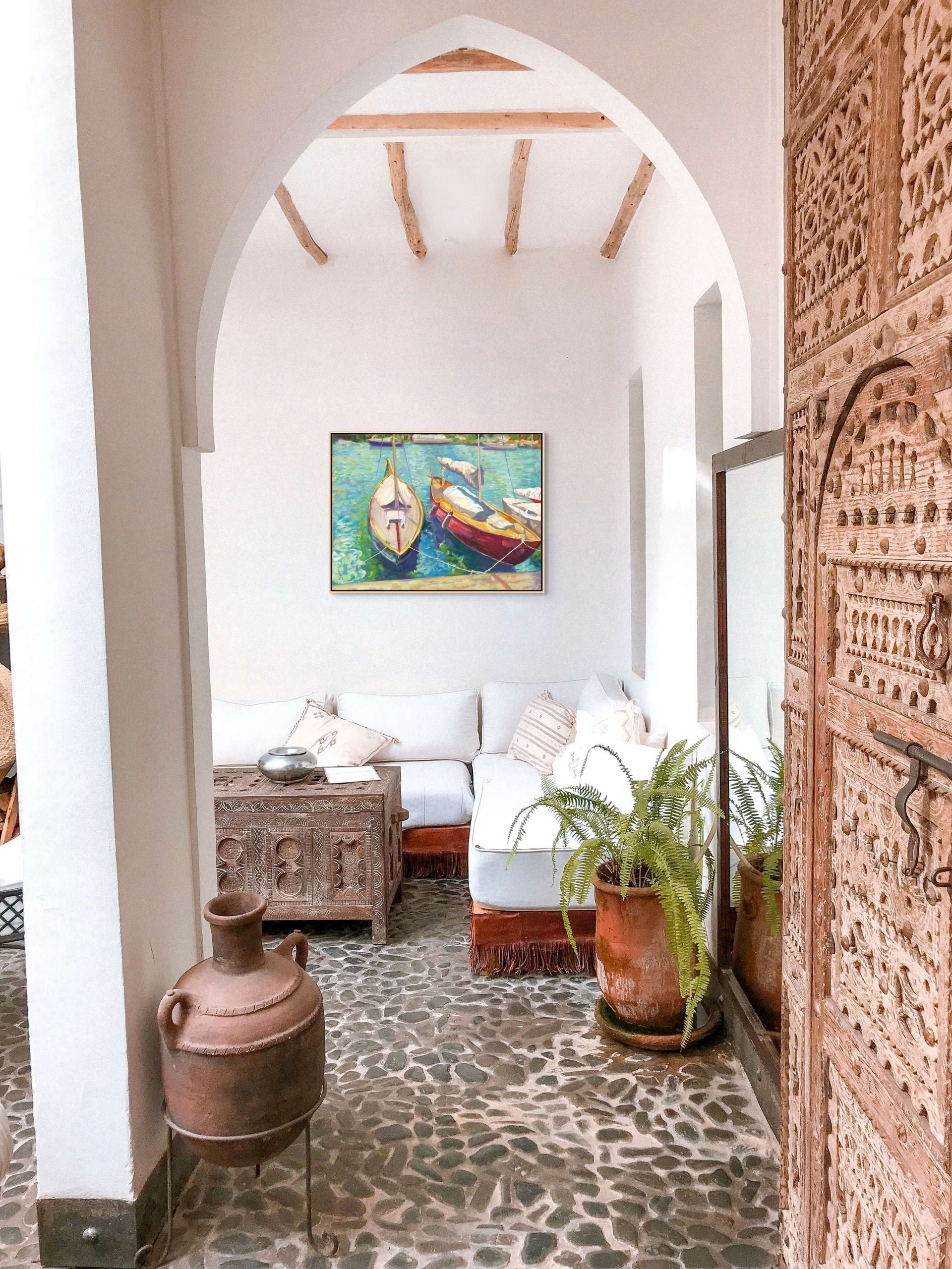"Aqua Ripples original oil painting displayed in a room with an arched doorway, by Sally Herriott"