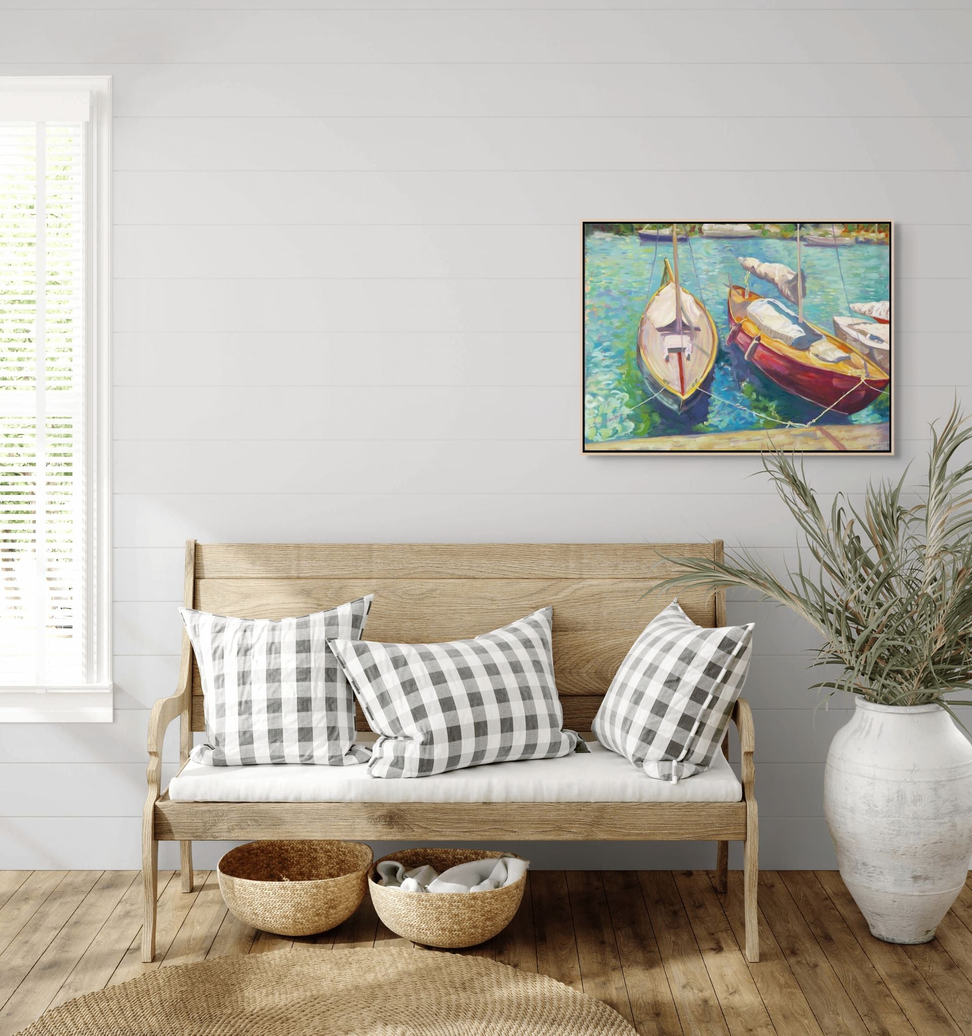 "Aqua Ripples original oil painting displayed with a wooden bench, by Sally Herriott"