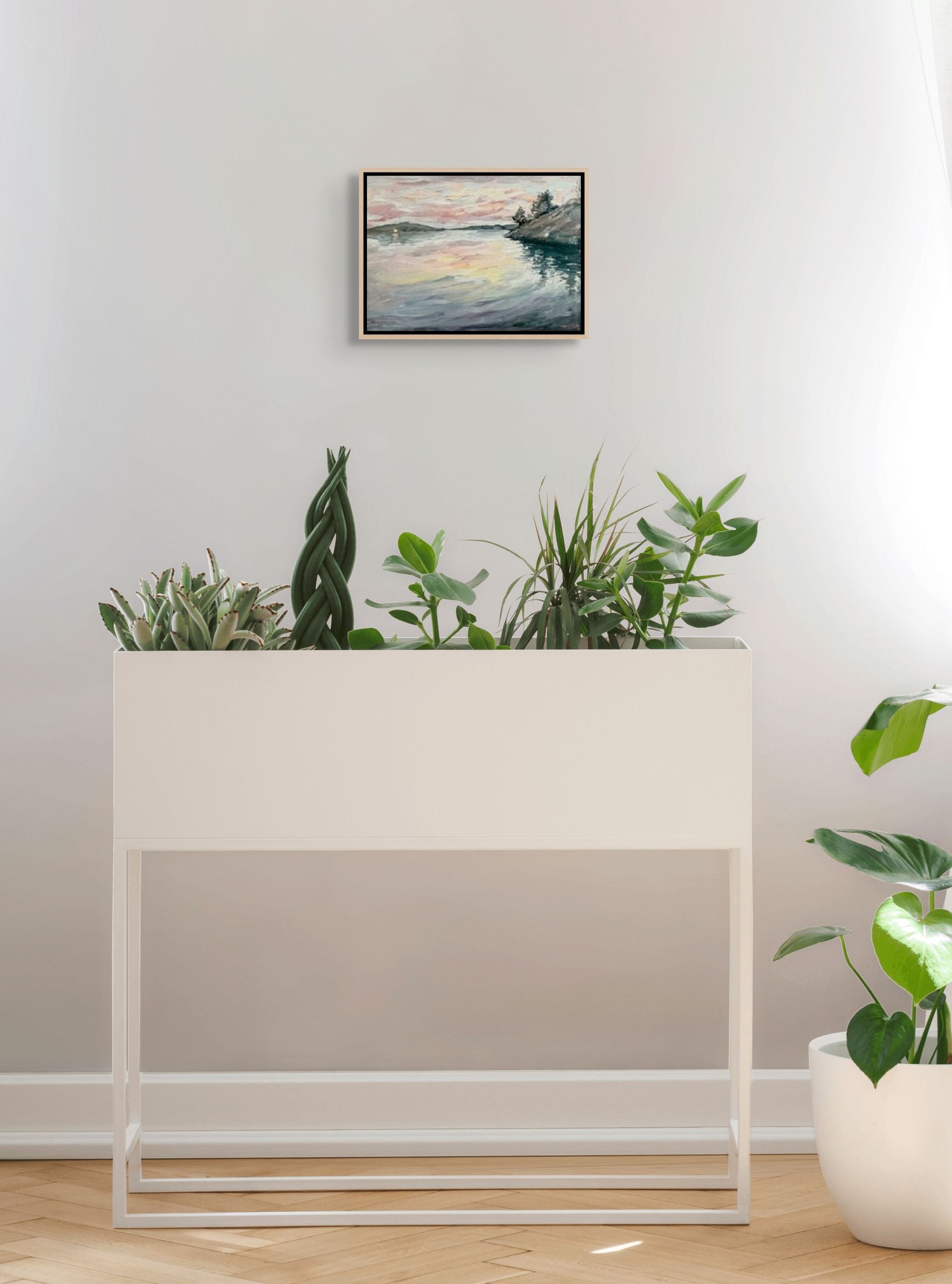 "Icecream Skies original oil painting displayed with plants, by Sally Herriott"