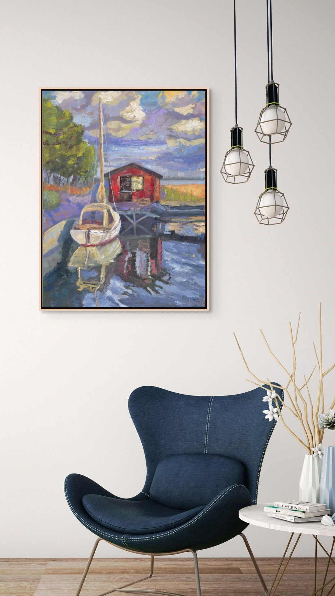"Purple Skies over Sailboat original oil painting above a trendy blue chair, by Sally Herriott"