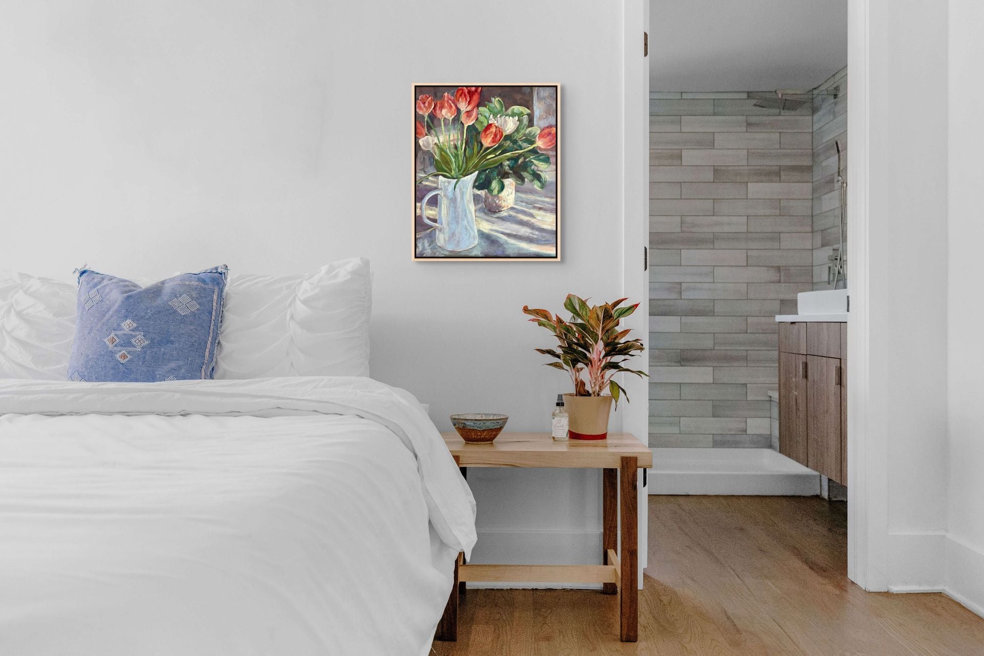 "Sunlit Tulips original still life oil painting in a modern hotel room, by Sally Herriott"