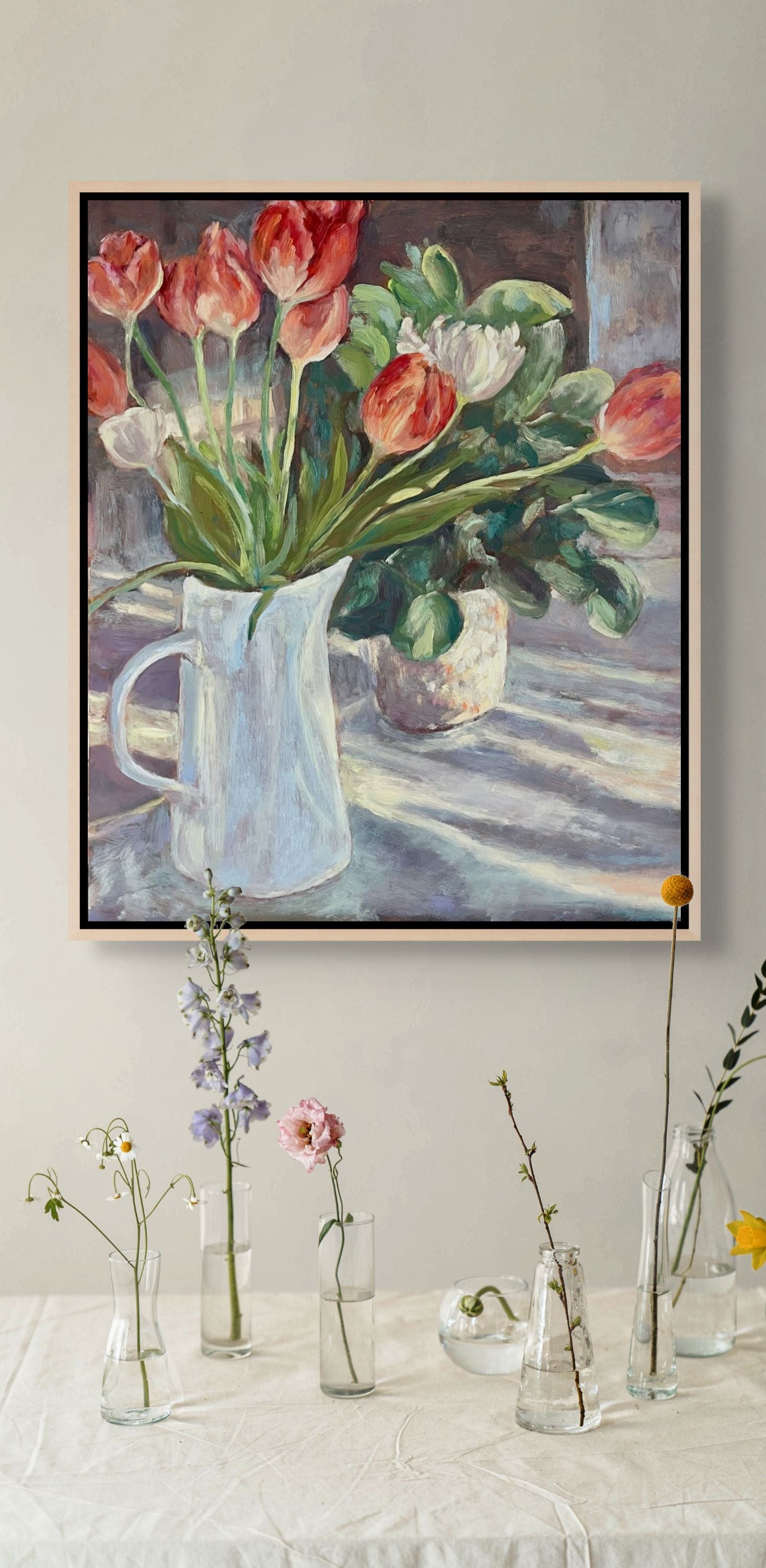 "Sunlit Tulips original still life oil painting displayed with sprig and glass vases, by Sally Herriott"