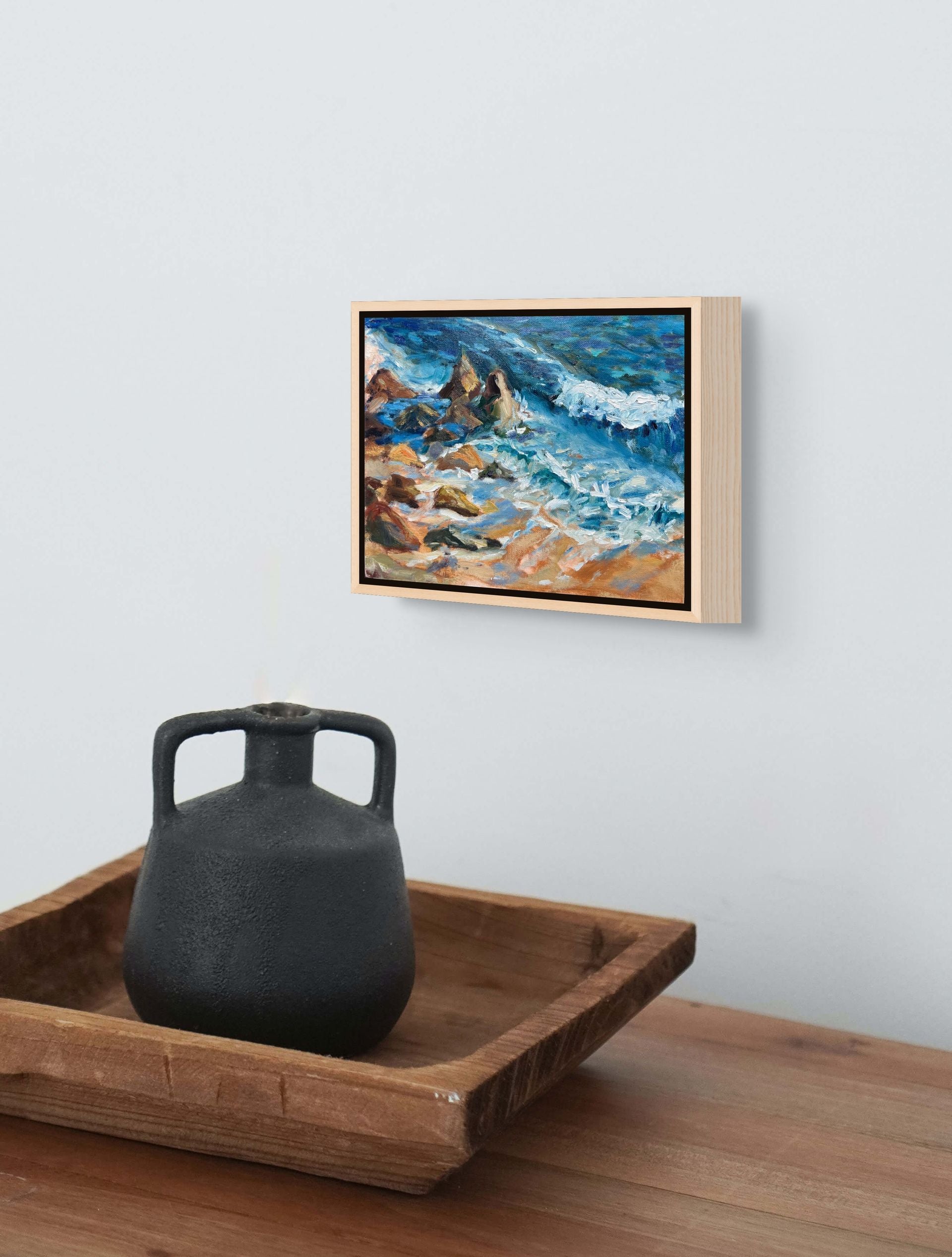 "Swell Waves original oil painting displayed with an antique vase, by Sally Herriott"